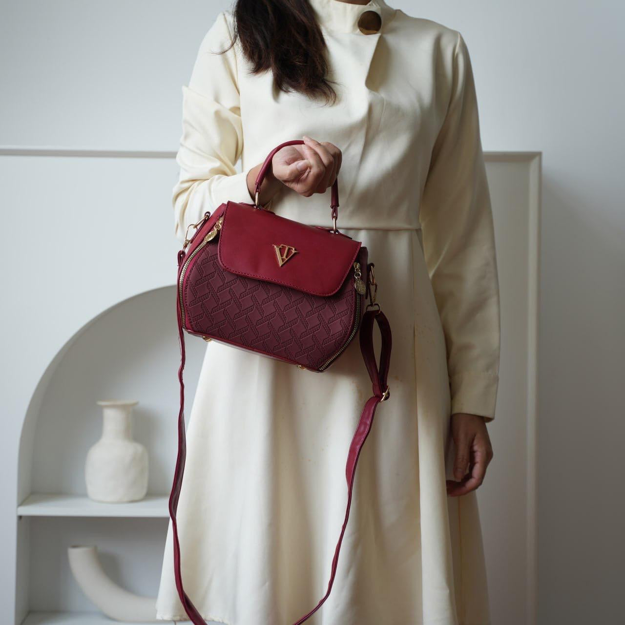 OVAL SMALL HANDBAG
